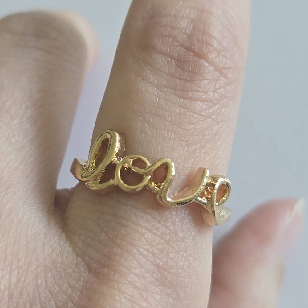 Gold Tone Love Script Ring Size 7 NEW